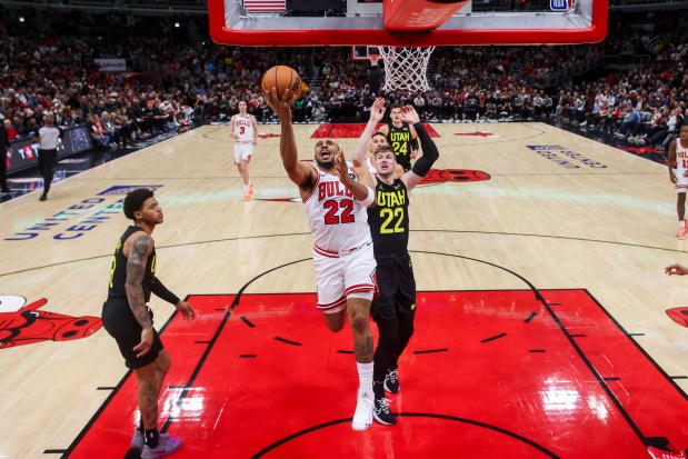 Chicago Bulls forward Talen Horton-Tucker (22) goes up for basket against Utah Jazz forward Kyle Filipowski (22) during the first half at the United Center Monday Nov. 4, 2024, in Chicago. (Armando L. Sanchez/Chicago Tribune)