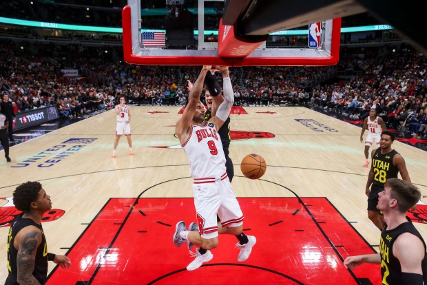 Chicago Bulls center Nikola Vucevic (9) dunks the ball during the first half against the Utah Jazz at the United Center Monday Nov. 4, 2024, in Chicago. (Armando L. Sanchez/Chicago Tribune)