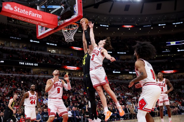 Chicago Bulls guard Josh Giddey (3) guards Utah Jazz center Walker Kessler (24) during the first quarter at the United Center Monday Nov. 4, 2024, in Chicago. (Armando L. Sanchez/Chicago Tribune)