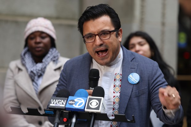 Ahead of a Chicago Police Department budget hearing, Ald. Byron-Sigcho Lopez joins community leaders outside City Hall to call for prioritization of root-cause public safety approaches and a close examination of the police budget, Nov. 15, 2024. (Antonio Perez/Chicago Tribune)