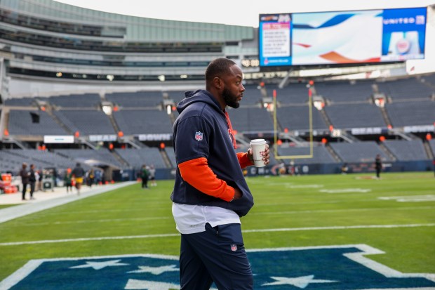 Bears offensive coordinator Thomas Brown walks on the field before the Bears play the Green Bay Packers at Soldier Field Sunday Nov. 17, 2024, in Chicago. (Armando L. Sanchez/Chicago Tribune)