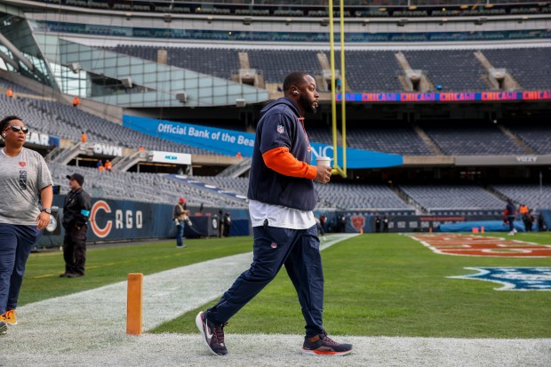 Bears offensive coordinator Thomas Brown walks on the field before the Bears play the Packers at Soldier Field Sunday Nov. 17, 2024. (Armando L. Sanchez/Chicago Tribune)