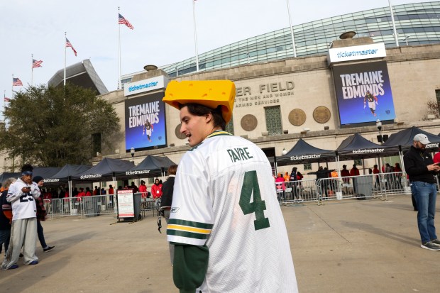 A Packers fan walks outside the field before the Bears play the Green Bay Packers. (Armando L. Sanchez/Chicago Tribune)