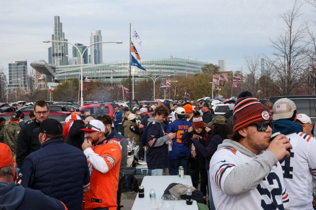 Fans tailgate before the Bears play the Green Bay Packers at Soldier Field. (Armando L. Sanchez/Chicago Tribune)