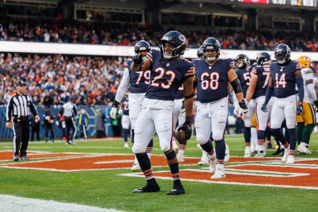 Chicago Bears running back Roschon Johnson (23) celebrates after scoring a touchdown during the second quarter against the Green Bay Packers at Soldier Field Sunday Nov. 17, 2024, in Chicago. (Armando L. Sanchez/Chicago Tribune)