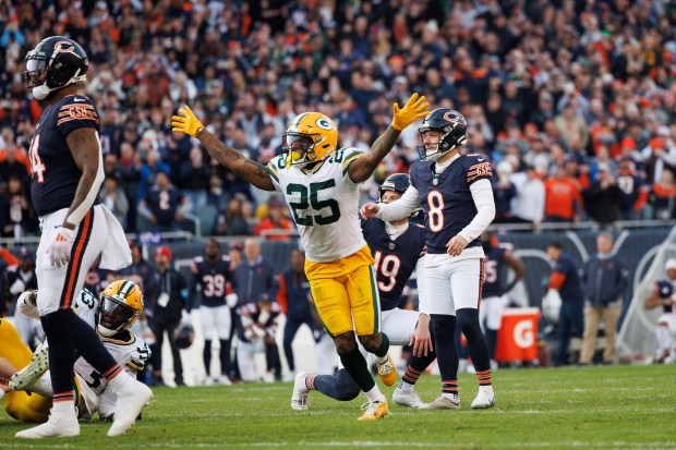 Green Bay Packers cornerback Keisean Nixon (25) celebrates after Chicago Bears place kicker Cairo Santos (8) kick was blocked by Green Bay Packers defensive end Karl Brooks (94) to give the Packers a, 20-19, win over the Bears at Soldier Field Sunday Nov. 17, 2024, in Chicago. (Armando L. Sanchez/Chicago Tribune)