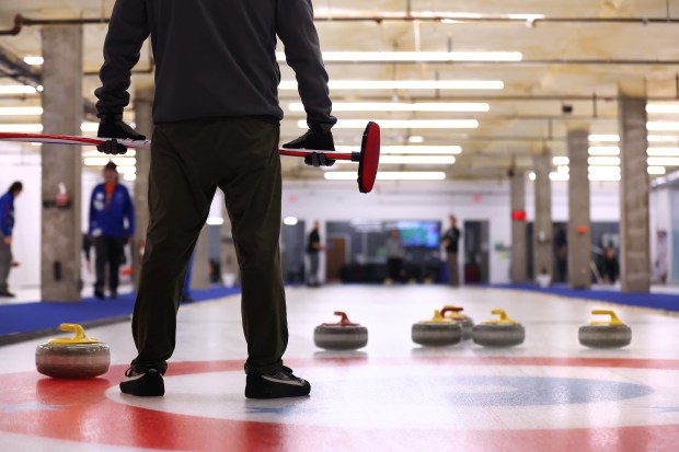 Members of a club league compete at Windy City Curling in Villa Park on Nov. 14, 2024. (Chris Sweda/Chicago Tribune)