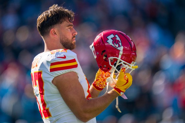 Chiefs tight end Travis Kelce put his helmet against the Panthers on Nov. 24, 2024, in Charlotte, N.C. (AP Photo/Rusty Jones)