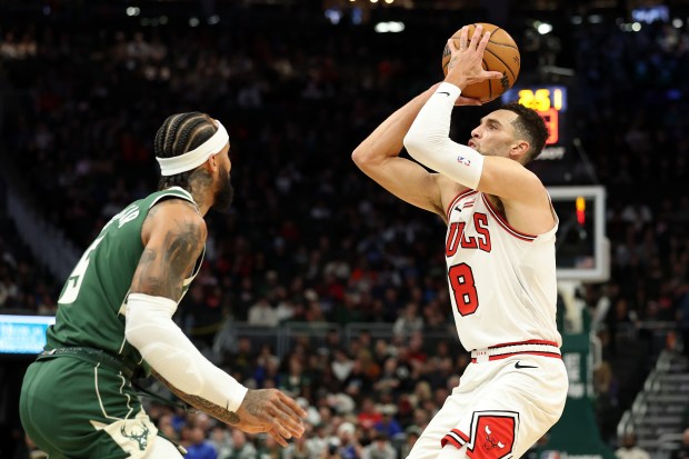 Bulls guard Zach LaVine shoots over the Bucks' Gary Trent during the first half on Nov. 20, 2024, in Milwaukee. (Stacy Revere/Getty)