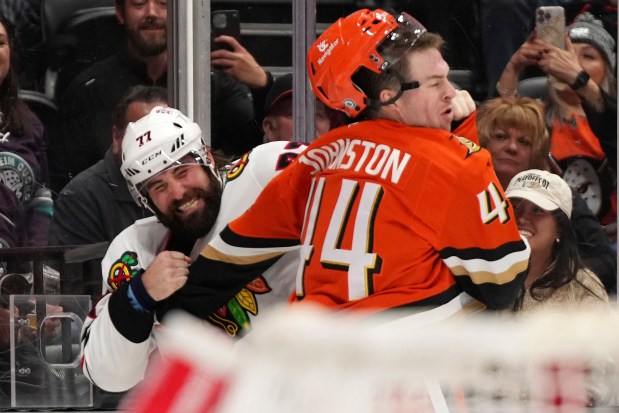 Chicago Blackhawks left wing Patrick Maroon, left, and Anaheim Ducks left wing Ross Johnston fight during the second period of an NHL hockey game, Sunday, Nov. 3, 2024, in Anaheim, Calif. (AP Photo/Mark J. Terrill)