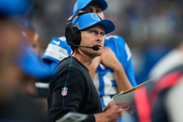 Detroit Lions offensive coordinator Ben Johnson watches against the Tennessee Titans during an NFL football game, Oct. 27, 2024, in Detroit. (AP Photo/Paul Sancya)