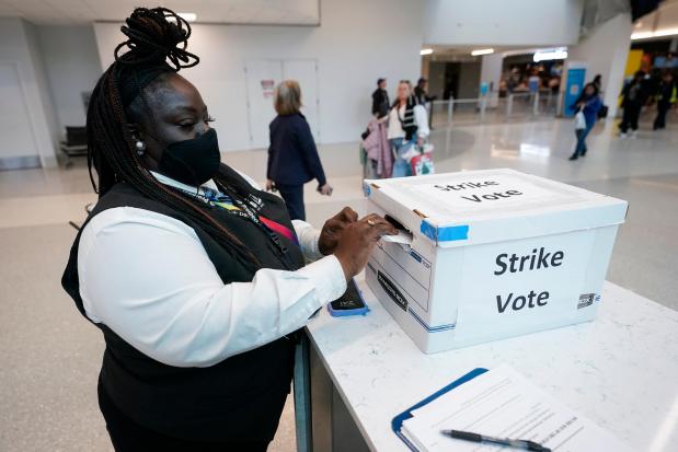 LaQuanda Harvey, a Prospect airport service worker, votes in favor of a strike at Charlotte Douglas International Airport, Friday, Nov. 22, 2024, in Charlotte, N.C. (AP Photo/Erik Verduzco)