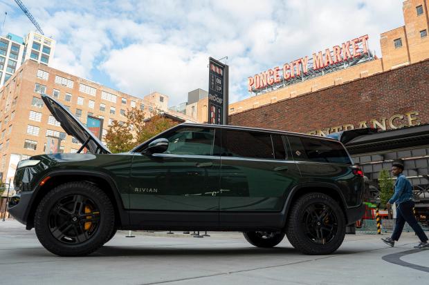 A Rivian R1S is displayed outside of the auto manufacturer's new space at Ponce City Market on Oct. 19, 2023, in Atlanta. (Matthew Pearson/WABE)