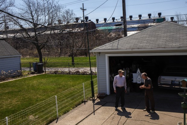 Jeff Myers (left) and Steve Krajnik were photographed in their Hammond's Robertsdale neighborhood, which sits in the shadow of the former Federated Metals plant, in this 2018 file photo on Tuesday May 1, 2018. Lead and arsenic contamination led the U.S. Environmental Protection Agency to label the site a federal Superfund site in September 2023.