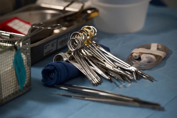 Surgical instruments and supplies lay on a table during a kidney transplant surgery at MedStar Georgetown University Hospital in Washington D.C., Tuesday, June 28, 2016. (AP Photo/Molly Riley, File)