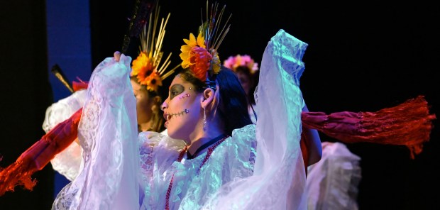 Center, Alessandra Manzano, 12, a seventh-grader from Pleasant Prairie, Wisconsin performs with Grupo Folklorico México en la piel of Waukegan at the Village of Round Lake Beach Day of the Dead Celebration on Nov. 1, 2024 in Round Lake Beach. (Karie Angell Luc/Lake County News-Sun)