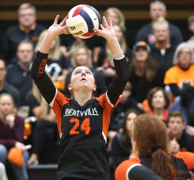 Libertyville's Makenzie Tyrrell (24)sets for Grace Coughlin (32) against Huntley during the Class 4A McHenry Sectional championship match on Thursday, Nov. 7, 2024 in McHenry.(H. Rick Bamman/for the News-Sun)