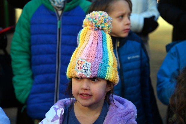 Corey Joseph, 5, a preschooler from Highland Park smiles at the Holiday Lighting event at Port Clinton Square in downtown Highland Park on Nov. 23, 2024. (Karie Angell Luc/Lake County News-Sun)