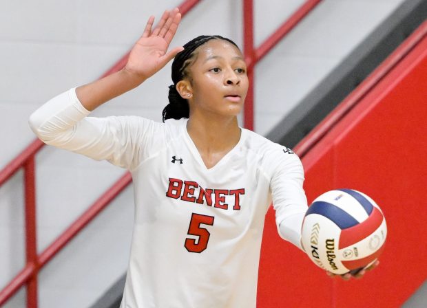 Benet's Brooklynne Brass (5) serves the ball against St. Charles North during the Class 4A West Aurora Sectional championship match in Aurora on Thursday, Nov. 7, 2024. (Mark Black / for the Beacon-News)