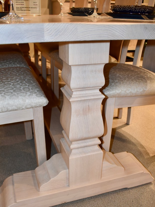 This table base is a good example of the kind of hand-made craftsmanship found in the custom-built pieces that can be ordered at Amish Furniture Gallery in Naperville and made by actual Amish craftsmen. (Steve Metsch/Naperville Sun)