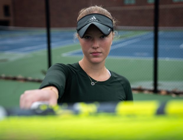 New Trier High School tennis player Ariane Lesterhuis poses for a portrait at New Trier High School in Winnetka on Monday, Nov. 4, 2024. Lesterhuis won the 2A state title in doubles, alongside her partner Keri Rothenberg, helping the Trevians to the team title. (Audrey Richardson/for the Pioneer Press)