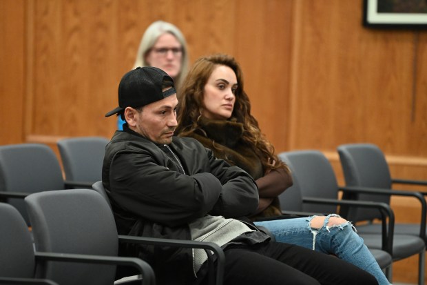 Seated in the first row, are, from left, BEAN BAR restaurateurs Kadir and Serah Cicek of Mount Prospect at the Northbrook Village Board of Trustees meeting on Nov. 12, 2024. (Karie Angell Luc/Pioneer Press)