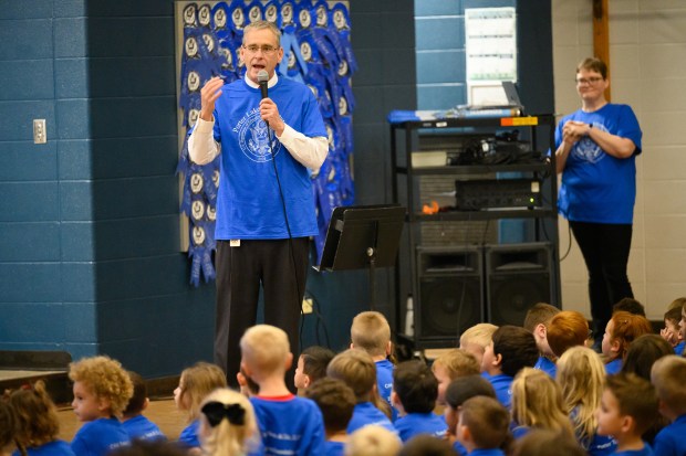 Porter Lakes Elementary principal Kevin Donnell speaks to students during a celebration to recognize the school's National Blue Ribbon status on Monday, Nov. 11, 2024. (Kyle Telechan/for the Post-Tribune)