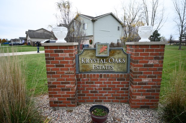 A Krystal Oaks Estates sign can be seen at the edge of the Cedar Lake subdivision on Wednesday, Nov. 27, 2024. (Kyle Telechan/for the Post-Tribune)