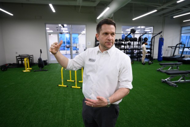 Hammond family YMCA executive director Kevin Klein points out features of one of the facility's workout areas during a tour of the newly-opened building on Friday, Nov. 22, 2024. (Kyle Telechan/for the Post-Tribune)