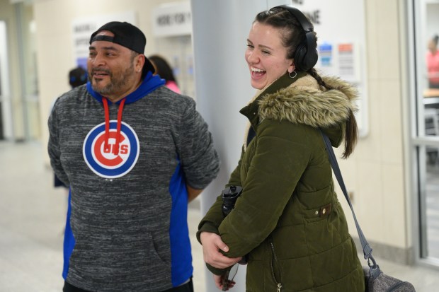 Munster resident Emily Zabrecky, on right, and East Chicago resident Steve Hernandez talk about their membership at the newly-opened Hammond Family YMCA on Friday, Nov. 22, 2024. (Kyle Telechan/for the Post-Tribune)