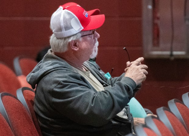 Hebron resident Jeff Grogan comments during a discussion about proposed electric rate hikes for NIPSCo customers on Monday, Nov. 18, 2024 at Hebron High School. (Michael Gard/for the Post-Tribune)