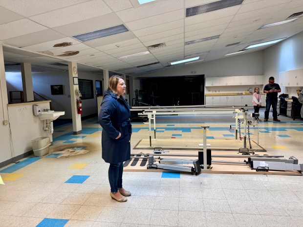 Northwest Health Porter Chief Operating Officer Sarah Hunter speaks inside a large room at the Portage Recovery Association's new home on Saturday, Nov. 16, 2024. (Doug Ross/for Post-Tribune)