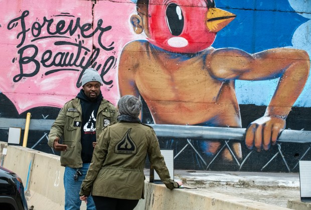 Decay Devils president Tyrell Anderson chats with vice president Lori Gonzalez outside Gary Union Station in Gary, Indiana Monday Nov. 25, 2024.(Andy Lavalley/for the Post-Tribune)