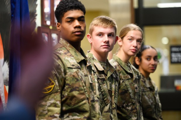 Members of the Hobart High School JROTC line up to be recognized by Lake County officials during an event to honor those who served at the Lake County Government Center in Crown Point on Thursday, Nov. 7, 2024. (Kyle Telechan/for the Post-Tribune)