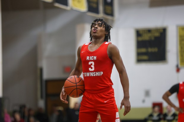 Rich Township's Jamson Coulter (3) takes a breath before a free throw during a game against Oak Forest in Oak Forest on Monday Feb. 5, 2024. (Troy Stolt for the Daily Southtown)