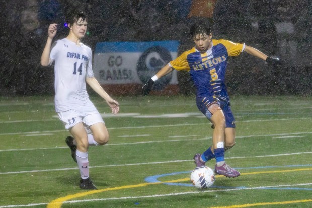 De La Salle's Alex Panduro (6) gains possession of the ball against DePaul Prep during the Class 2A De La Salle Supersectional in Chicago on Tuesday, Nov. 5, 2024. (Troy Stolt / for the Beacon-News)