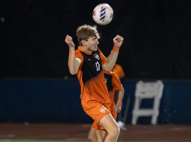 Hersey's Nate Mabry (11) goes up for a header against Lane Tech during the IHSA Class 3A state championship game in Hoffman Estates on Saturday, Nov. 9, 2024. (Troy Stolt / for the Pioneer Press)