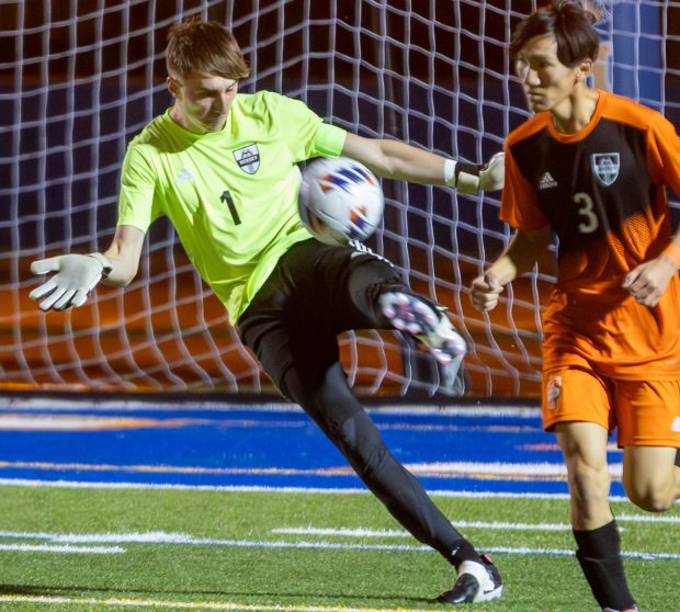 Hersey's Adrain Smakowski (1) clears the ball against Lane Tech during the IHSA Class 3A state championship game in Hoffman Estates on Saturday, Nov. 9, 2024.  (Troy Stolt / for the Pioneer Press)