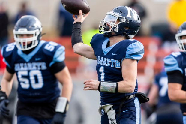 Nazareth Academy's Logan Malachuk (1) throws against Joliet Catholic during the first half of the Class 5A state championship game at Hancock Stadium in Normal on Saturday, Nov. 30, 2024. (Vincent D. Johnson / for the Daily Southtown)