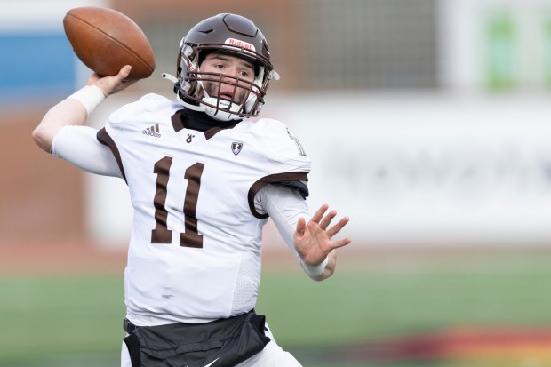 Joliet Catholic's Lucas Simulick (11) throws against Nazareth Academy in the Class 5A state championship game at Hancock Stadium in Normal on Saturday, Nov. 30, 2024. (Vincent D. Johnson / for the Daily Southtown)