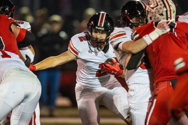 Lincoln-Way Central's Luke Tingley (2) finds a seam to run through against Bradley-Bourbonnais in the Class 7A state quarterfinals in Bradley on Friday, Nov. 15, 2024. (Vincent D. Johnson / for the Daily Southtown)