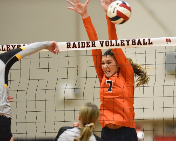 Oswego's Hannah Herrick (7) goes up for a block against Joliet West during the Class 4A Bolingbrook Sectional semifinals Tuesday, Nov. 5, 2024 in Bolingbrook, IL. (Steve Johnston/for the The Beacon-News)