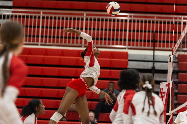 Homewood-Flossmoor's Kymora Scott spikes the ball against Sandburg during the Class 4A Homewood-Flossmoor Regional final in Flossmoor on Thursday, Oct. 31, 2024. (Vincent D. Johnson / for the Daily Southtown)