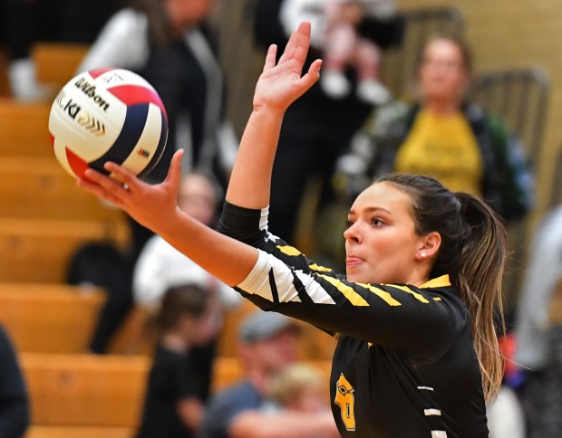 St. Laurence's Kayla Birmingham serves to DePaul College Prep during the Class 3A Hinsdale South Supersectional match on Monday, Nov. 11, 2024 in Darien...(Jon Cunningham for the Daily Southtown)