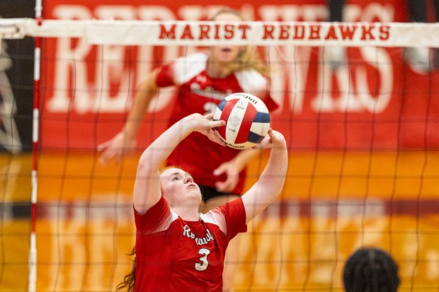 Marist's Maddie Berry (3) sets the ball against Lincoln-Way East in the Class 4A Marist Sectional semifinals in Chicago on Tuesday, Nov. 5, 2024. (Vincent D. Johnson / for the Daily Southtown)