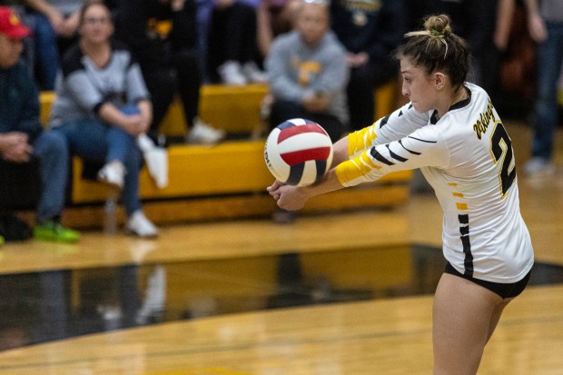 St. Laurence's Natalie Martinez (2) sets the ball against Lemont in the Class 3A St. Laurence Sectional championship match in Burbank on Thursday, Nov. 7, 2024. (Vincent D. Johnson / for the Daily Southtown)