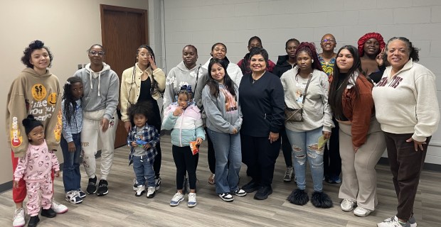 Dr. Shelley Amuh with participants in The Puddle Project's financial literacy workshop for teen mothers her nonprofit held in Oct.. (The Puddle Project)