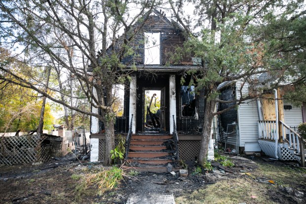 One of the homes on the east side of the 1500 block of Lowe Avenue in Chicago Heights was damaged in a fire that began Oct. 22, 2024. (Vincent D. Johnson / for the Daily Southtown)