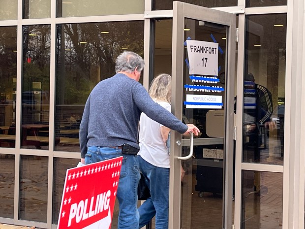 A couple enters the Frankfort Township office Nov. 5, 2024, at 11000 West Lincoln Highway to vote. (Samantha Moilanen/Daily Southtown)