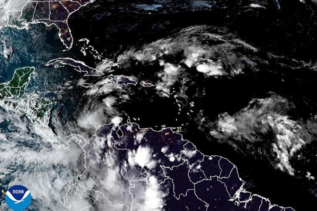 This satellite image provided by NOAA shows weather systems on Nov. 3, 2024. (NOAA via AP)